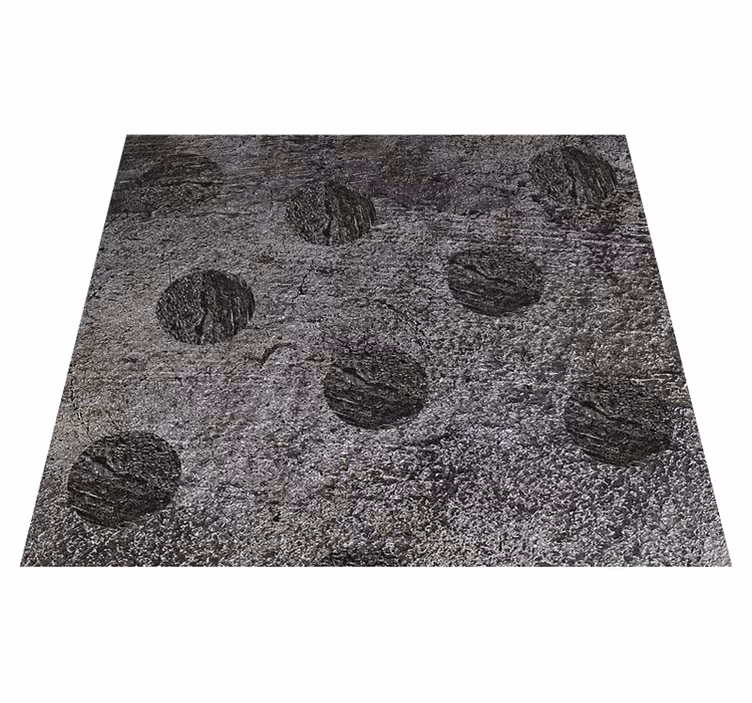 Alfombra vinílica gris con motivos circulares abstractos - TenVinilo