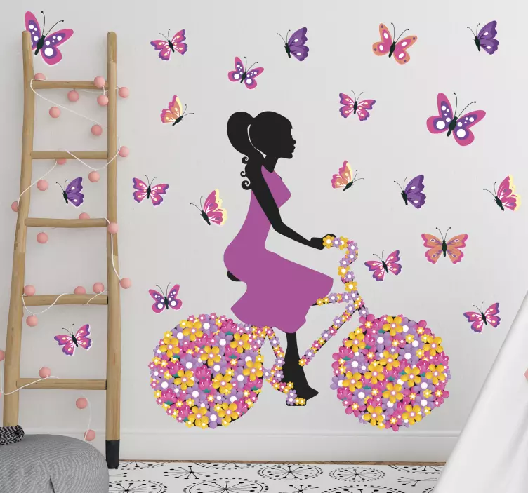 Vinilo mariposas y mujer en bicicleta - TenVinilo