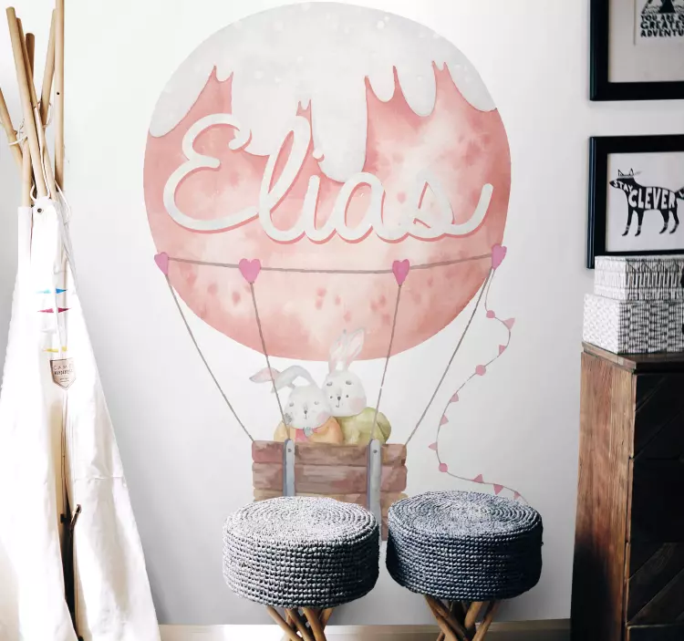 Vinilo ilustración Lindos conejitos en un globo - TenVinilo