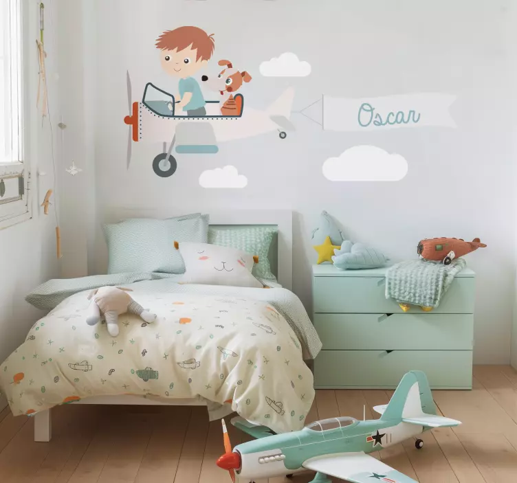 Vinilo ilustración niño y perro en un avión - TenVinilo